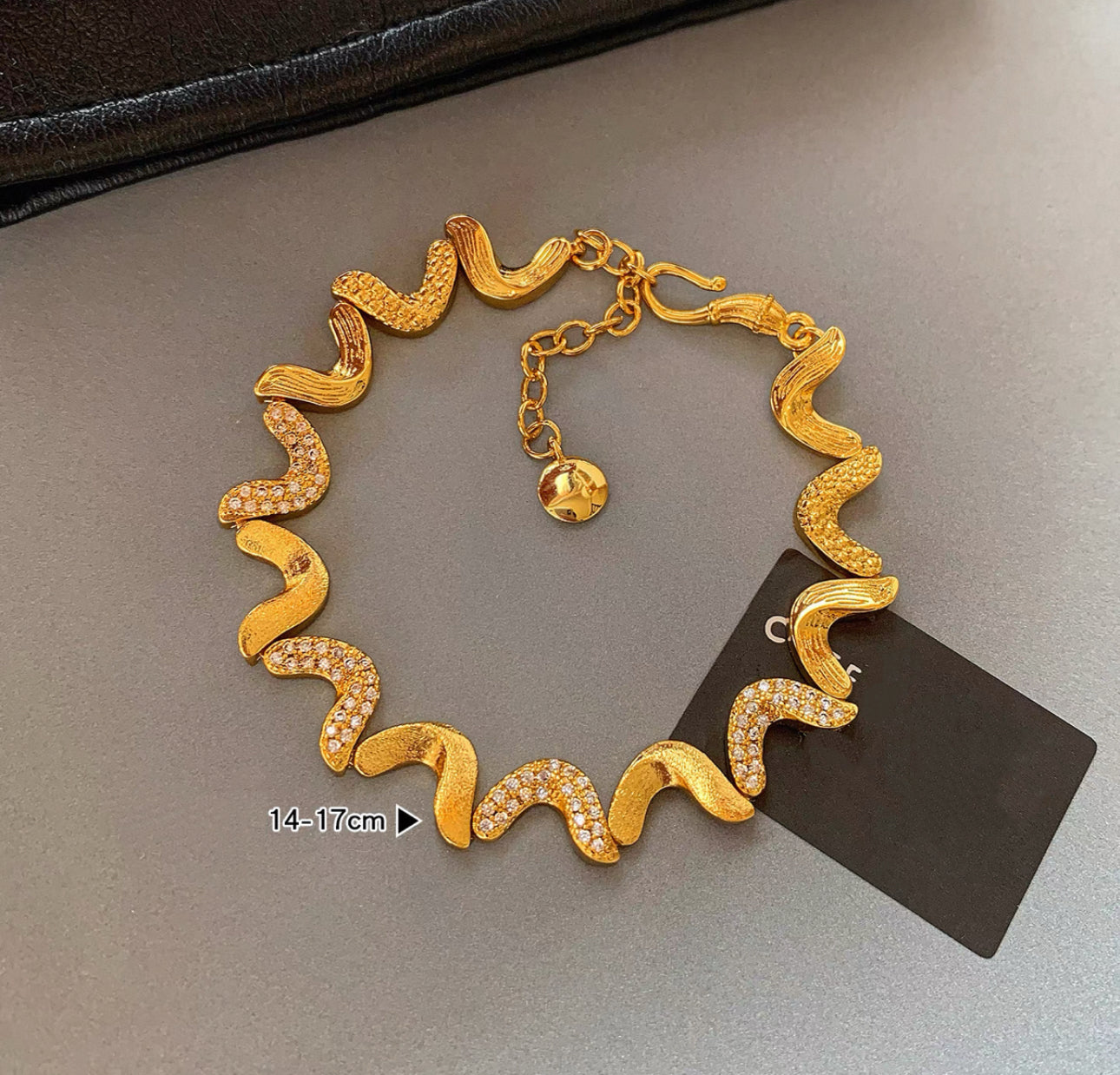 Gold Wave Bracelet with Zircon Accents(9)