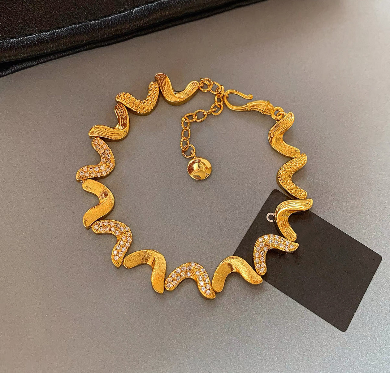 Gold Wave Bracelet with Zircon Accents(9)