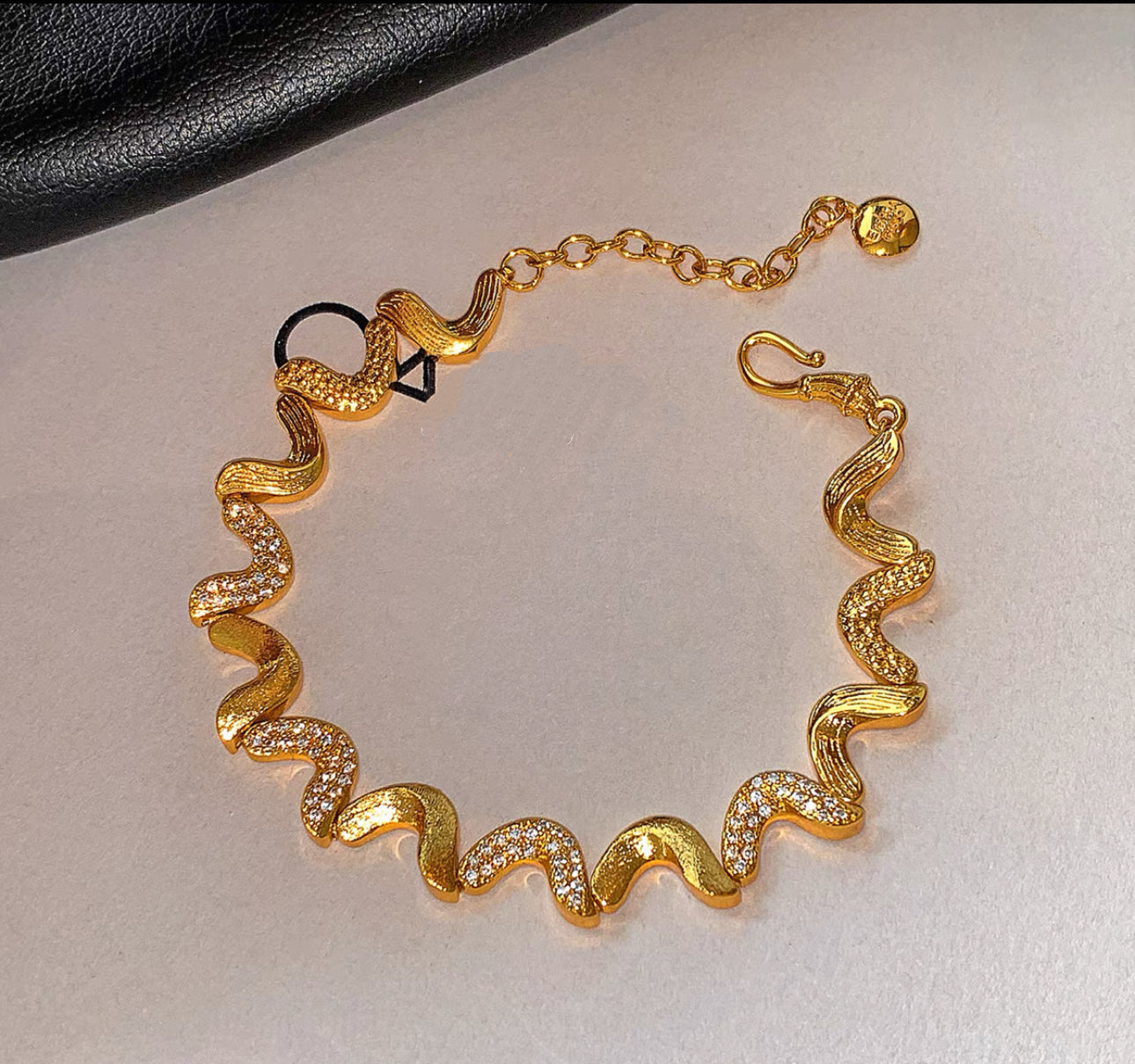Gold Wave Bracelet with Zircon Accents(9)