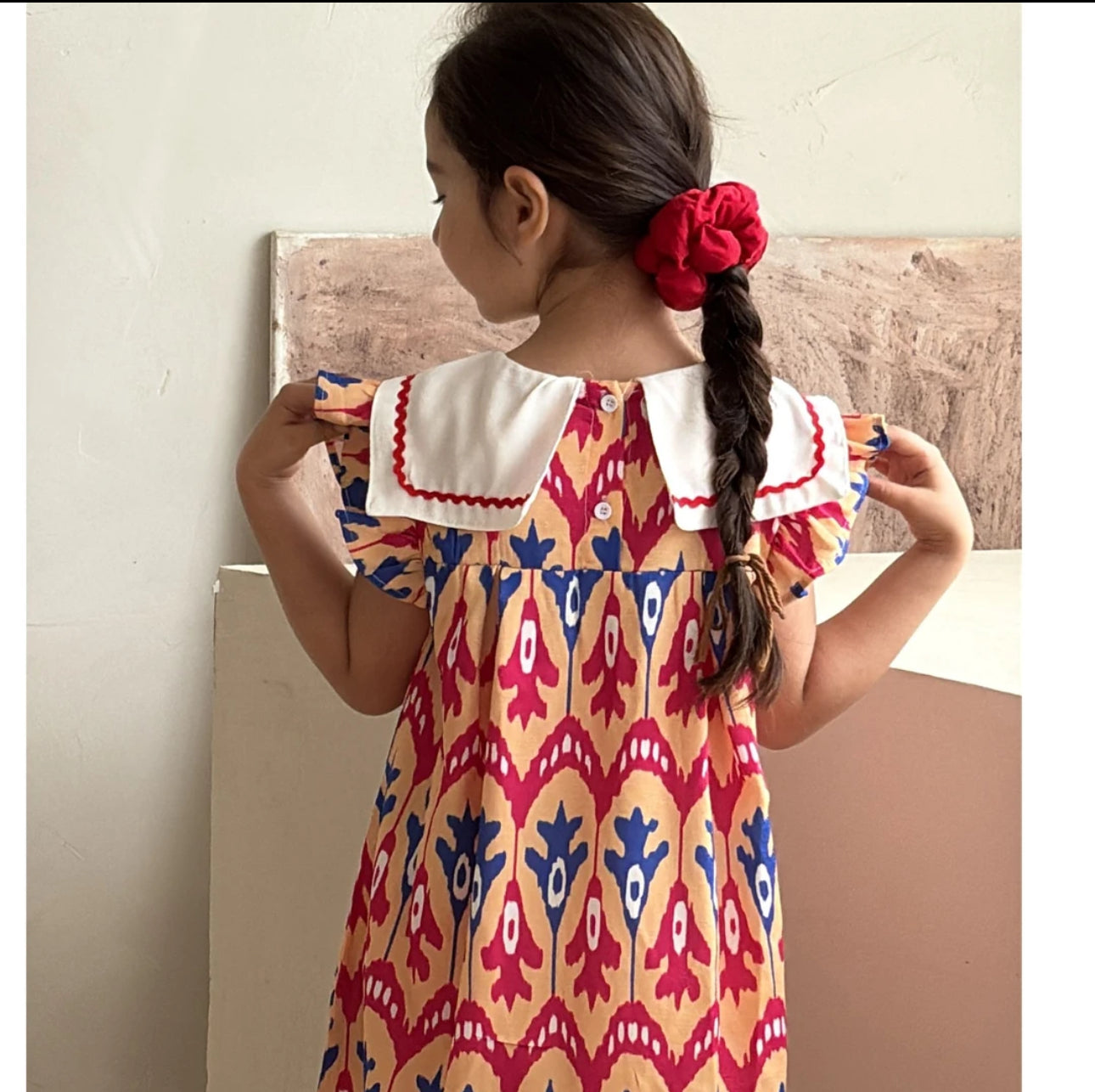 “Peach Bloom” Atlas Ikat Dress – Ruffle Sleeve & Peter Pan Collar | Fade-Resistant & Cool