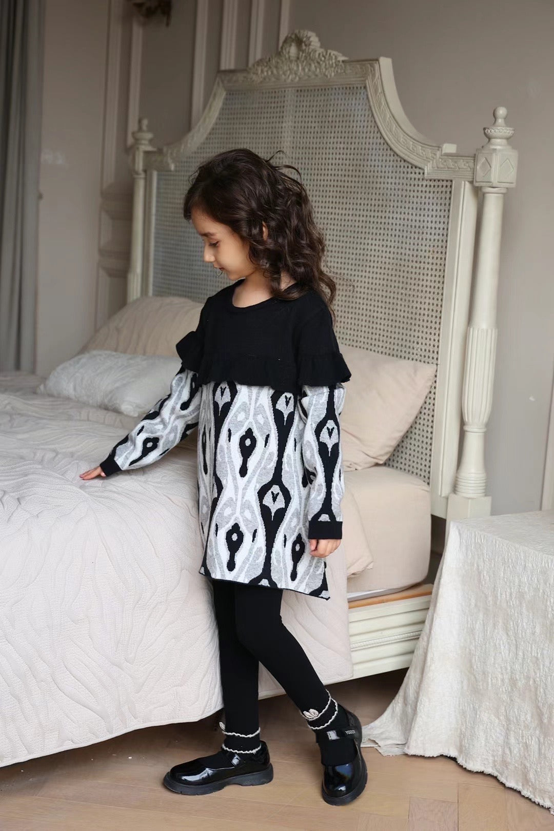 Girls’ Knit Dress – Black Ikat Pattern