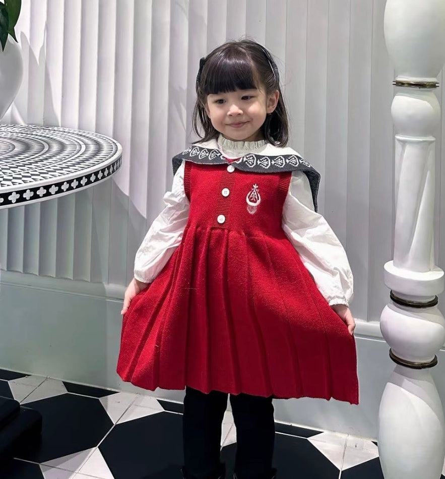 Child wearing colorful Liwanay kidswear in a real family moment