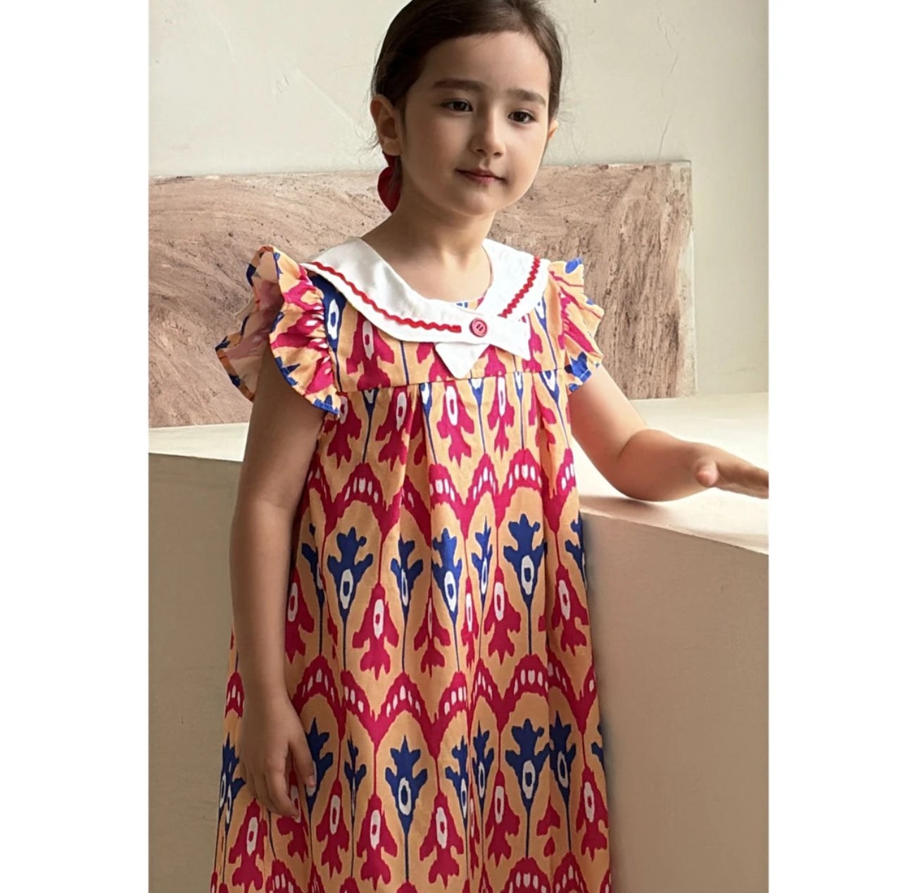 “Peach Bloom” Atlas Ikat Dress – Ruffle Sleeve & Peter Pan Collar | Fade-Resistant & Cool